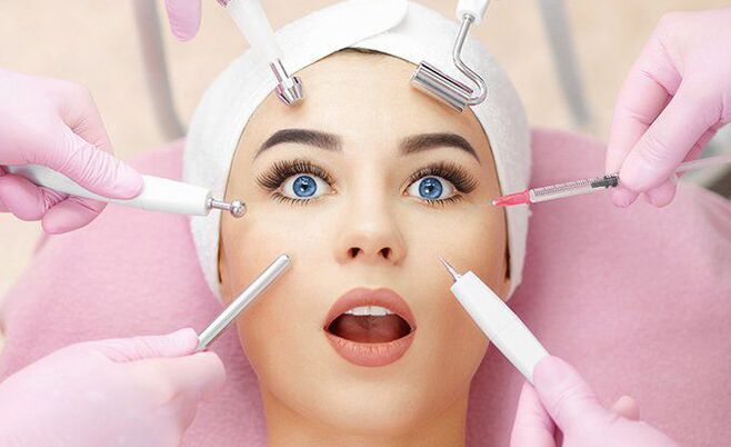 Devices and rejuvenation tools next to the girl's face
